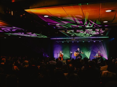 Josh Pyke performing in the banquet room