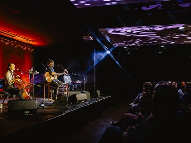 Josh Pyke performing in the banquet room
