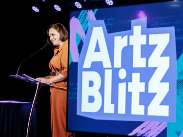 Cr Kirralee Ashworth-Collett speaking at the Artz Blitz 2025 award ceremony.