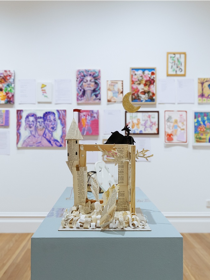 Sculpture of a mystical castle made out of paper