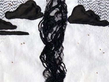 Sofie Dieu artwork: black embroidery, silk and lace scraps sewn onto white bed linen.