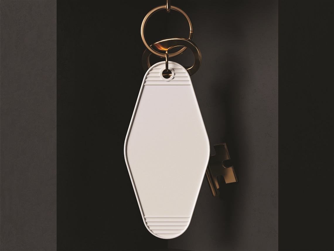 A keychain on a dark background.