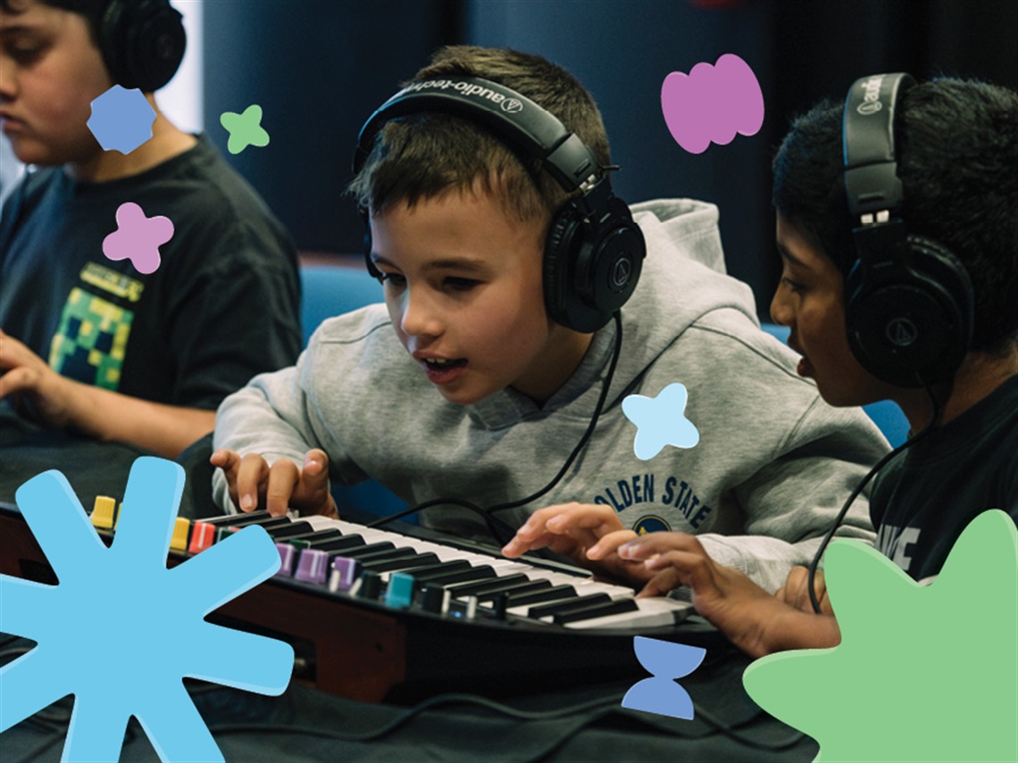 Children wearing headphones at a synth keyboard surrounded by floating graphics of shapes in blue, green and purple colours.