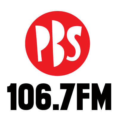 Red circle logo with PBS letters and 106.7FM in black underneath.