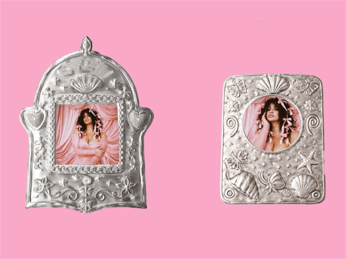 Two photographs of a dark haired female wearing pink in tin embossed photo frames against a pink backdrop