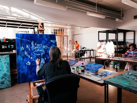 Resident artists Naomi Bishop, Kate Weeks and Aimee Harel at work in the Magnify Studio
